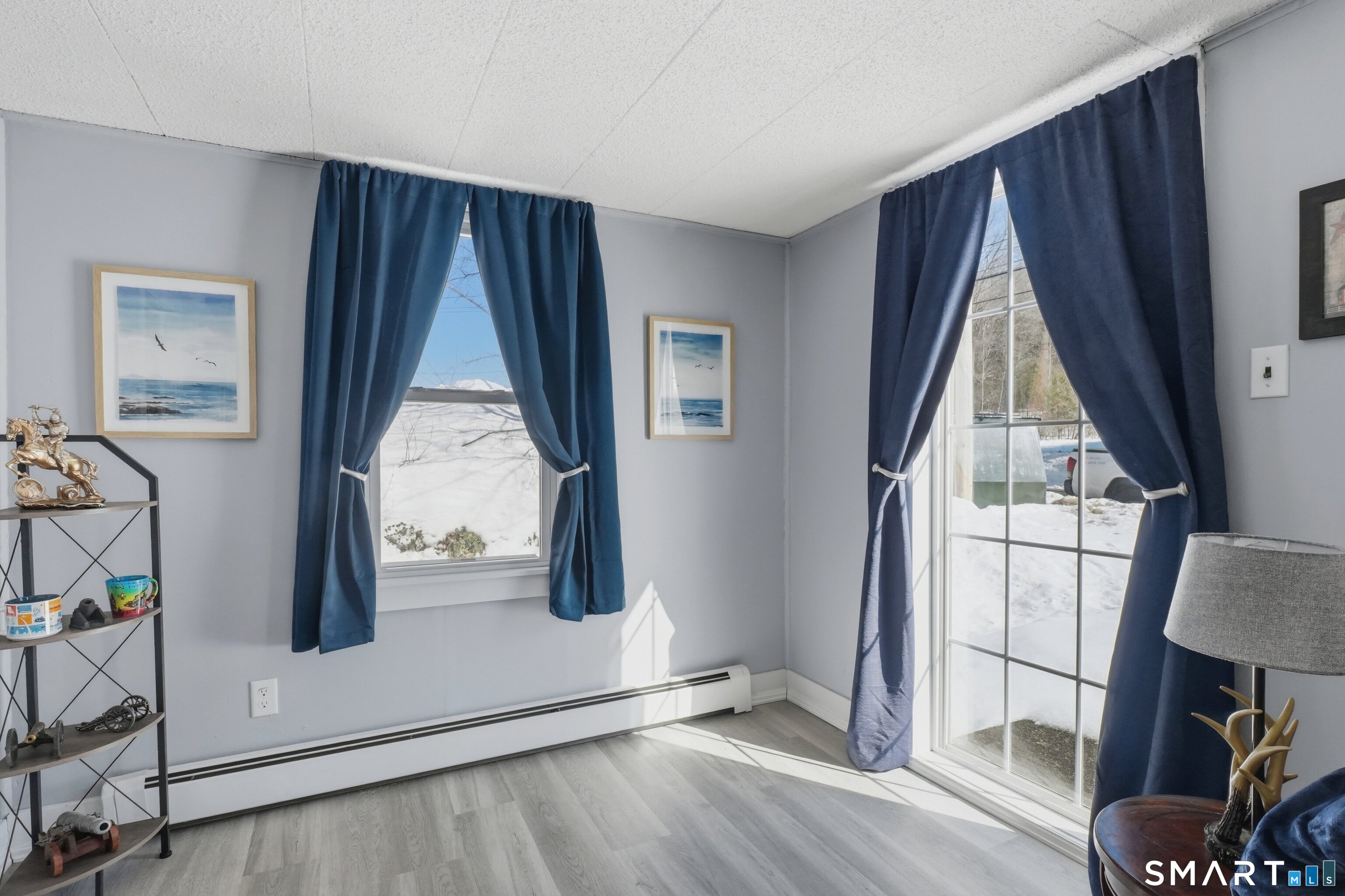 74 Riverside Drive Thompson, CT 06277 - Photo 8 of 25 a view of an entryway with wooden floor and door