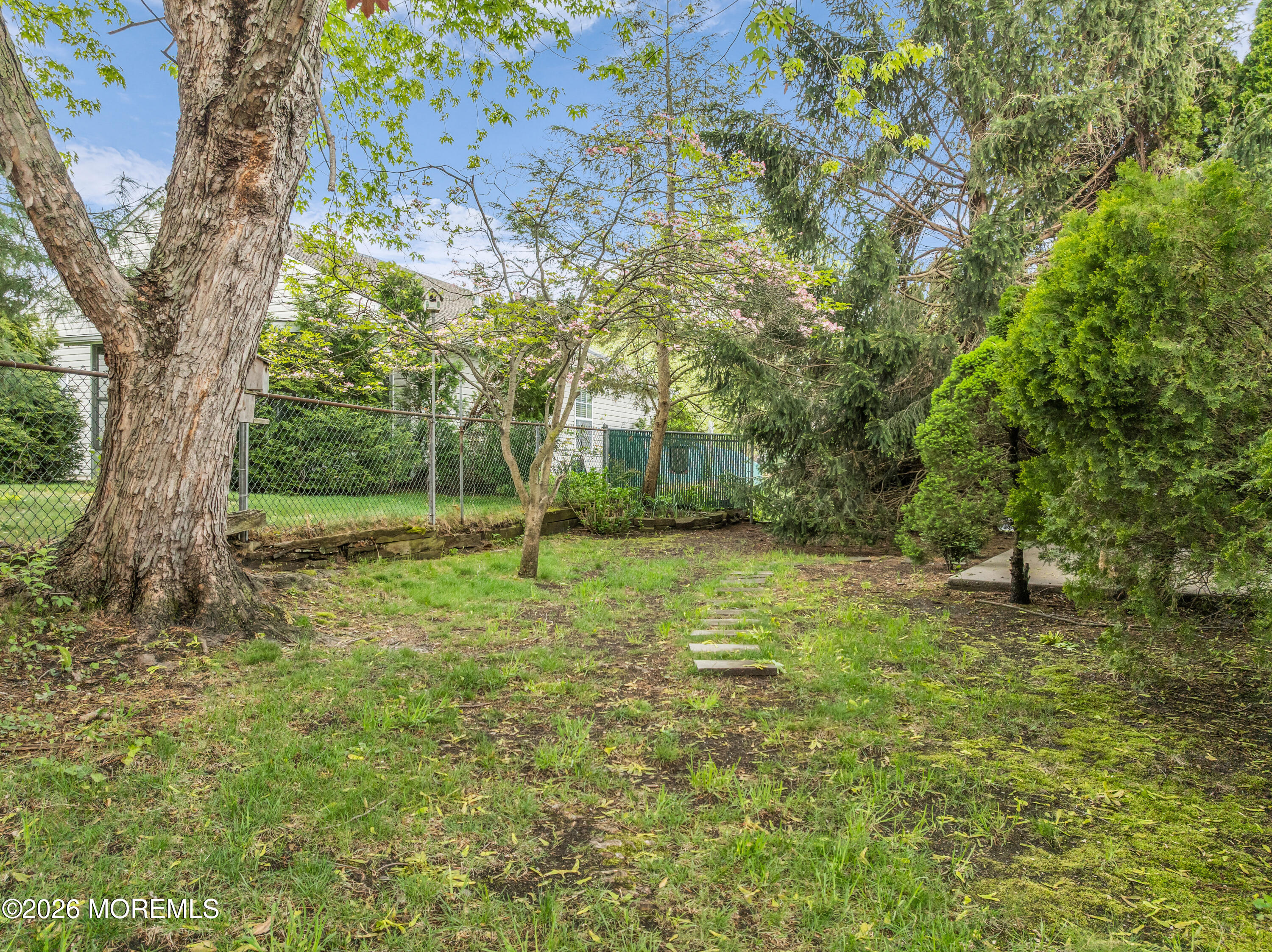 4 Brant Drive Brick, NJ 08724 - Photo 29 of 34 a view of a yard with a tree