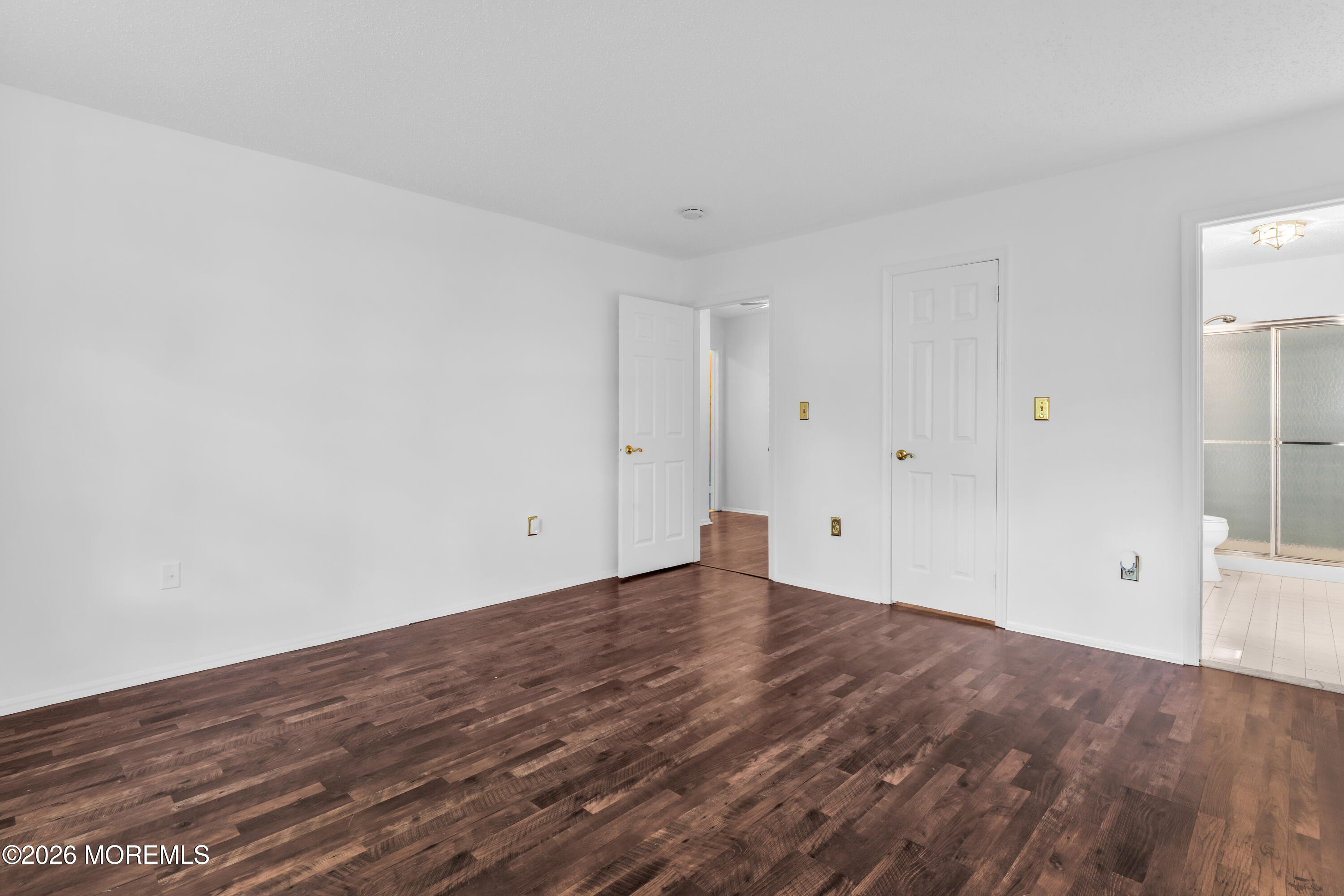 4 Brant Drive Brick, NJ 08724 - Photo 9 of 34 a view of an empty room with wooden floor