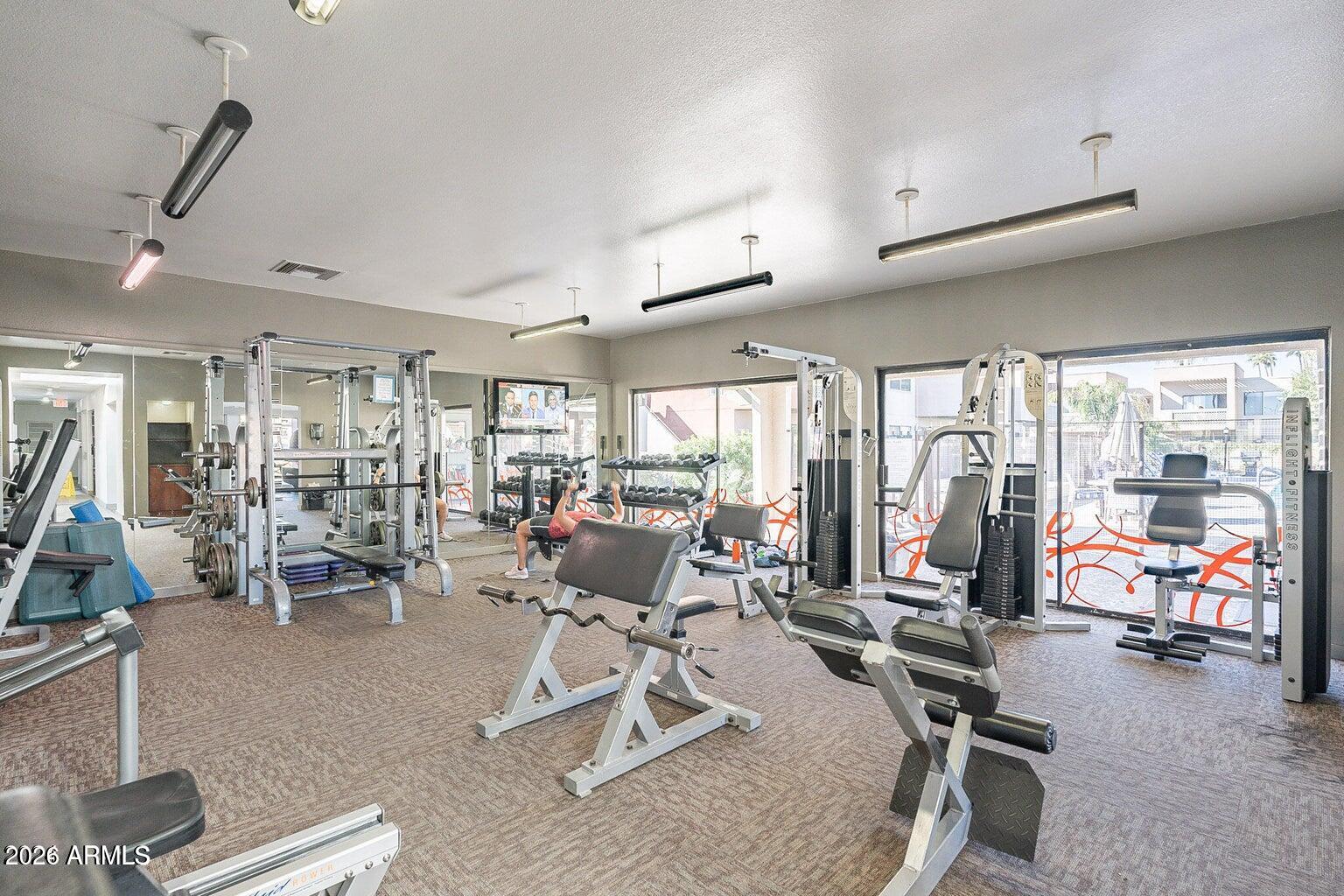 3600 North Hayden Road, Unit 3410 Scottsdale, AZ 85251 - Photo 16 of 22 a view of a room with gym equipment