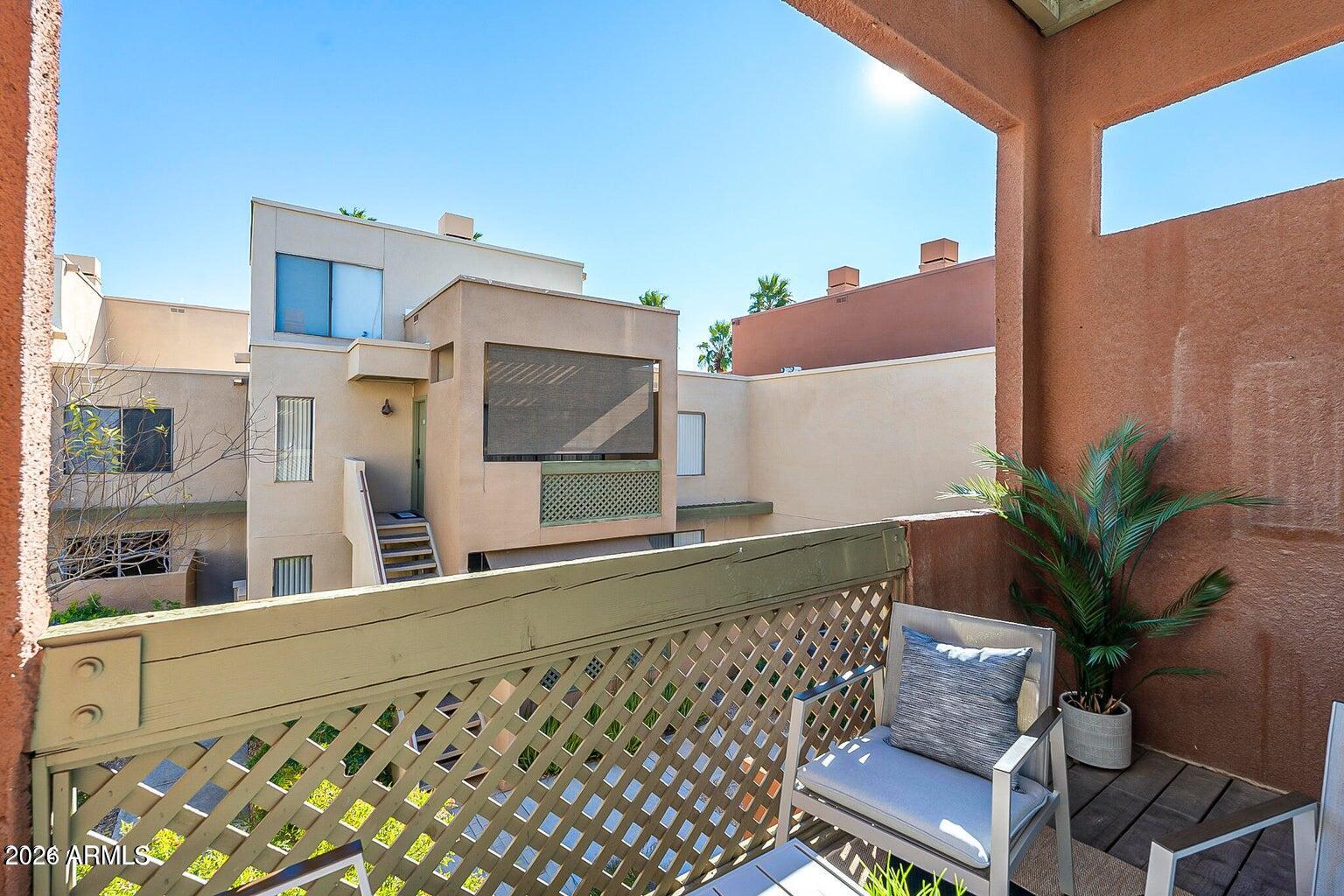 3600 North Hayden Road, Unit 3410 Scottsdale, AZ 85251 - Photo 8 of 22 a potted plants sitting in front of a building