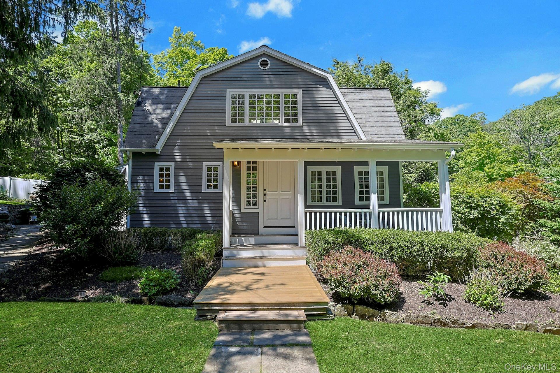 65 Douglas Road Chappaqua, NY 10514 - Photo 40 of 41 A welcoming front door, entry and porch are classic 1930s charm.