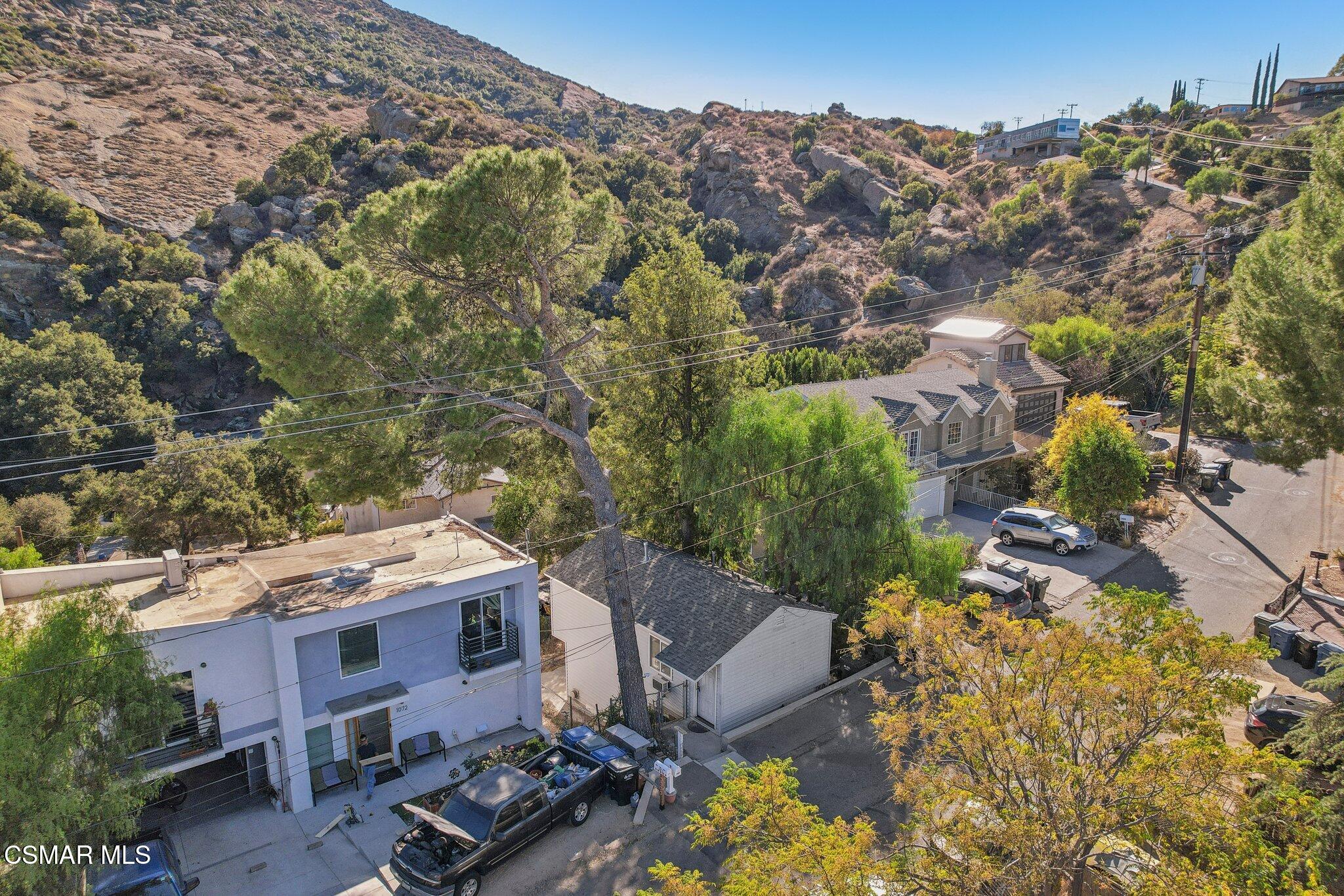 1068 Alta Vista Road Simi Valley, CA 93063 - Photo 1 of 16 an aerial view of a house with a yard