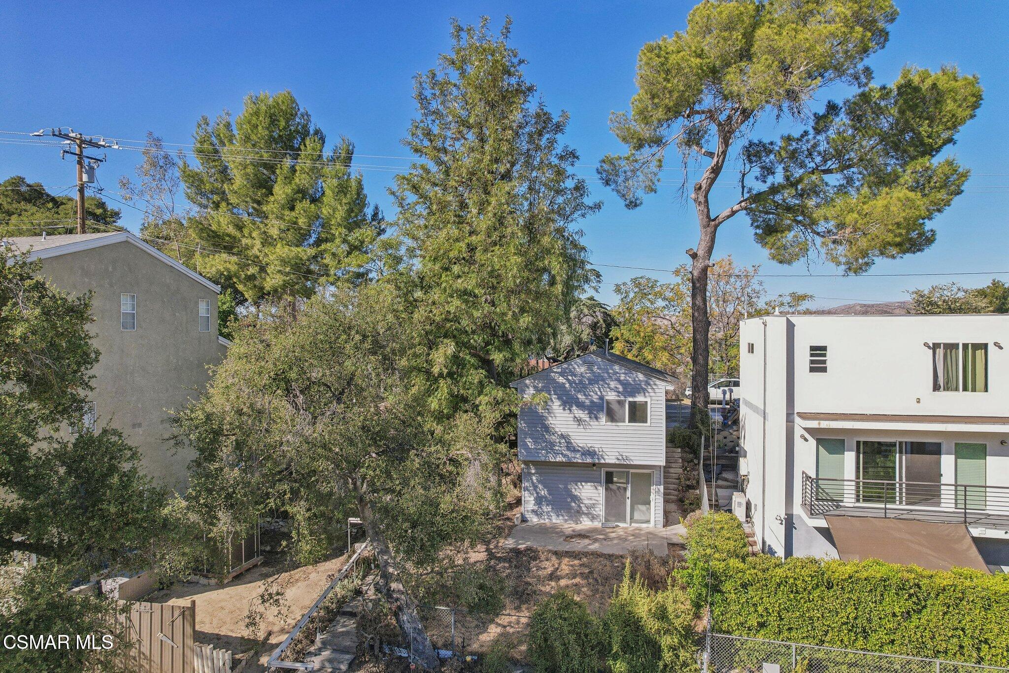 1068 Alta Vista Road Simi Valley, CA 93063 - Photo 13 of 16 an aerial view of multiple houses with yard
