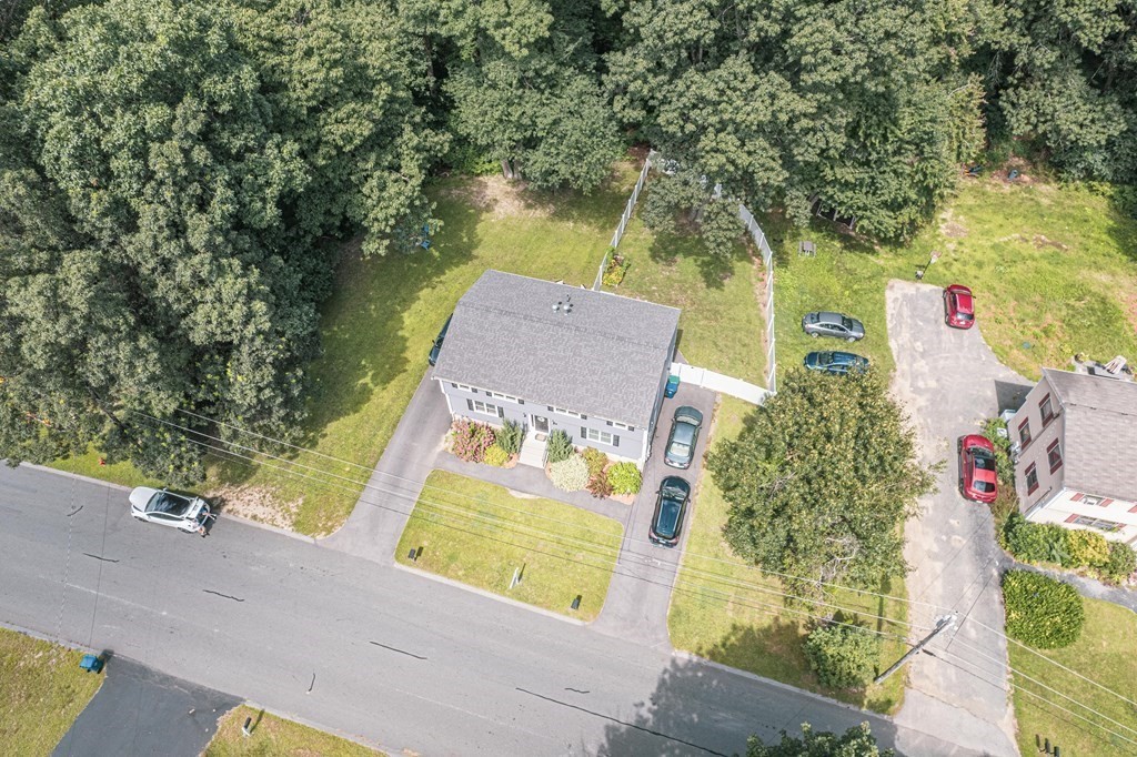 28 Pondover Road, Unit 28 Billerica, MA 01821 - Photo 4 of 4 an aerial view of a house with swimming pool