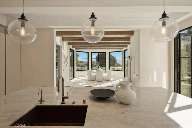 a view of a livingroom with furniture and windows