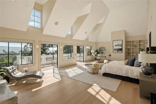 a view of a chair and table in the garden