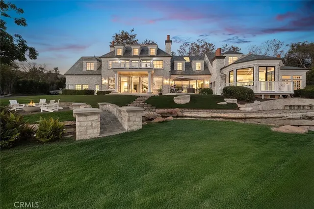a living room with furniture window and a wooden floor