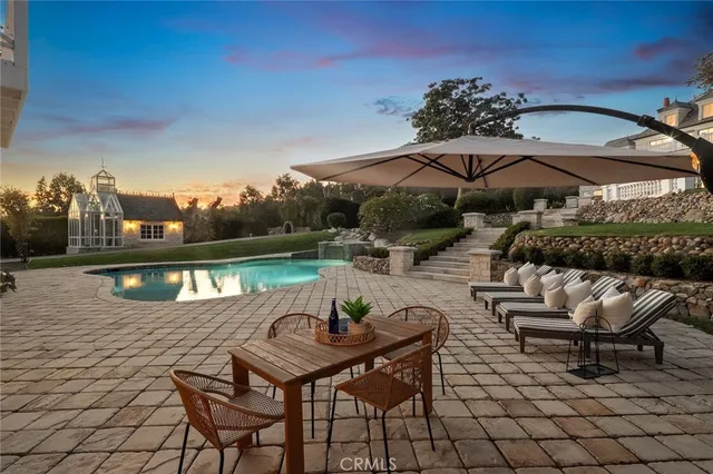 a view of house with a yard