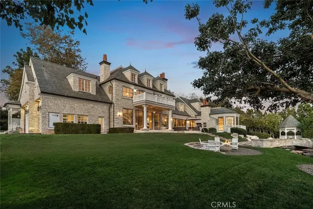 a front view of a house with a ocean view