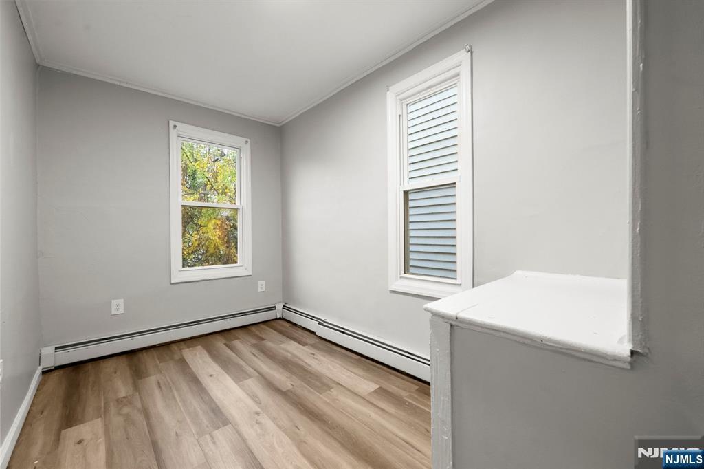 282 Hamilton Avenue Paterson, NJ 07501 - Photo 9 of 21 an empty room with windows