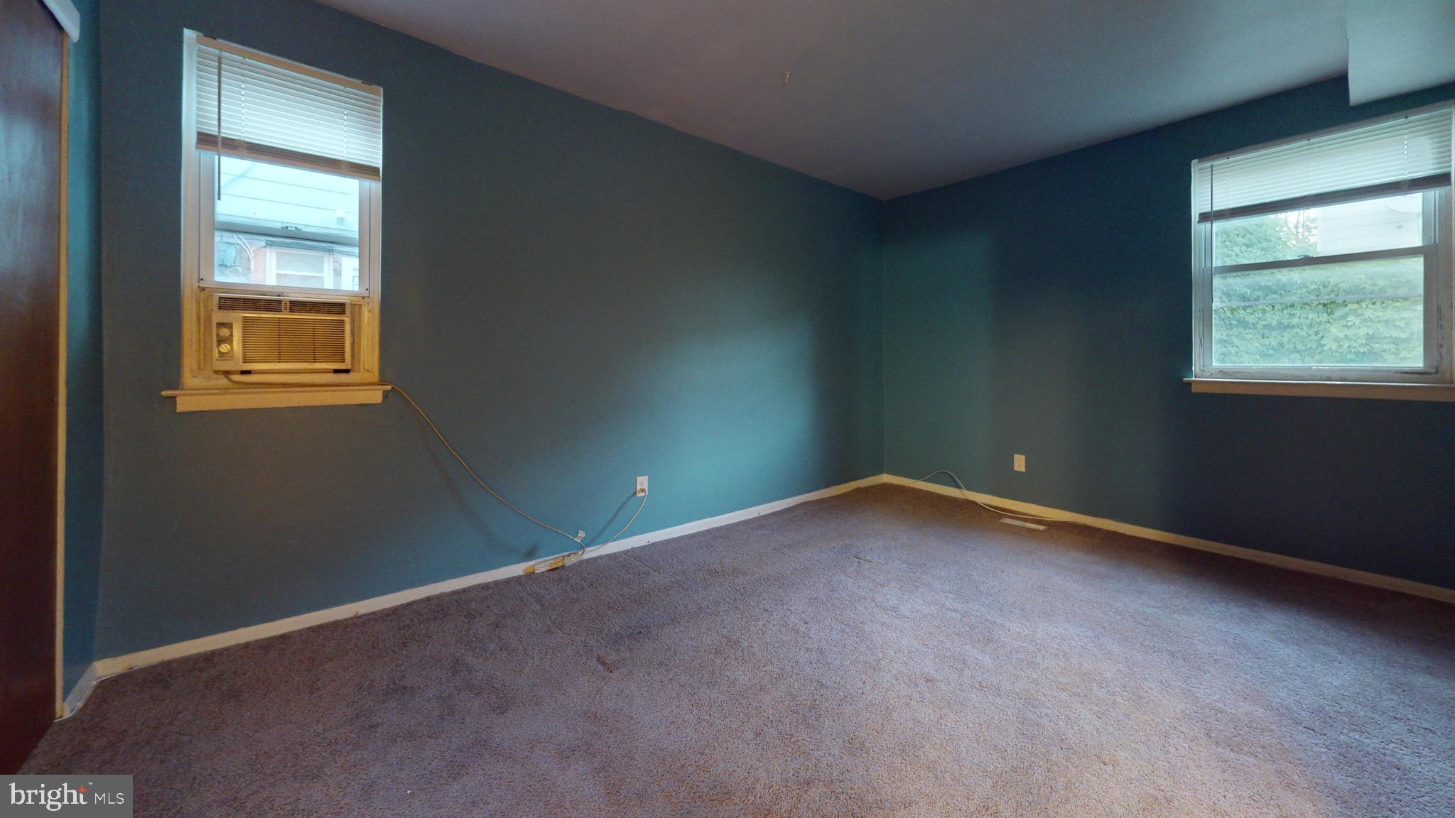 717 Red Lion Road, Unit 1 Philadelphia, PA 19116 - Photo 7 of 9 an empty room with a window