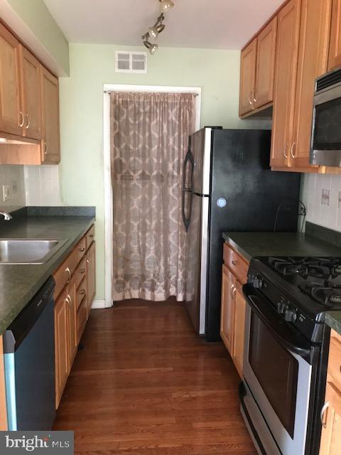 74 Ridgelawn Road, Unit A Reisterstown, MD 21136 - Photo 6 of 13 Plenty of cabinets in this updated kitchen.