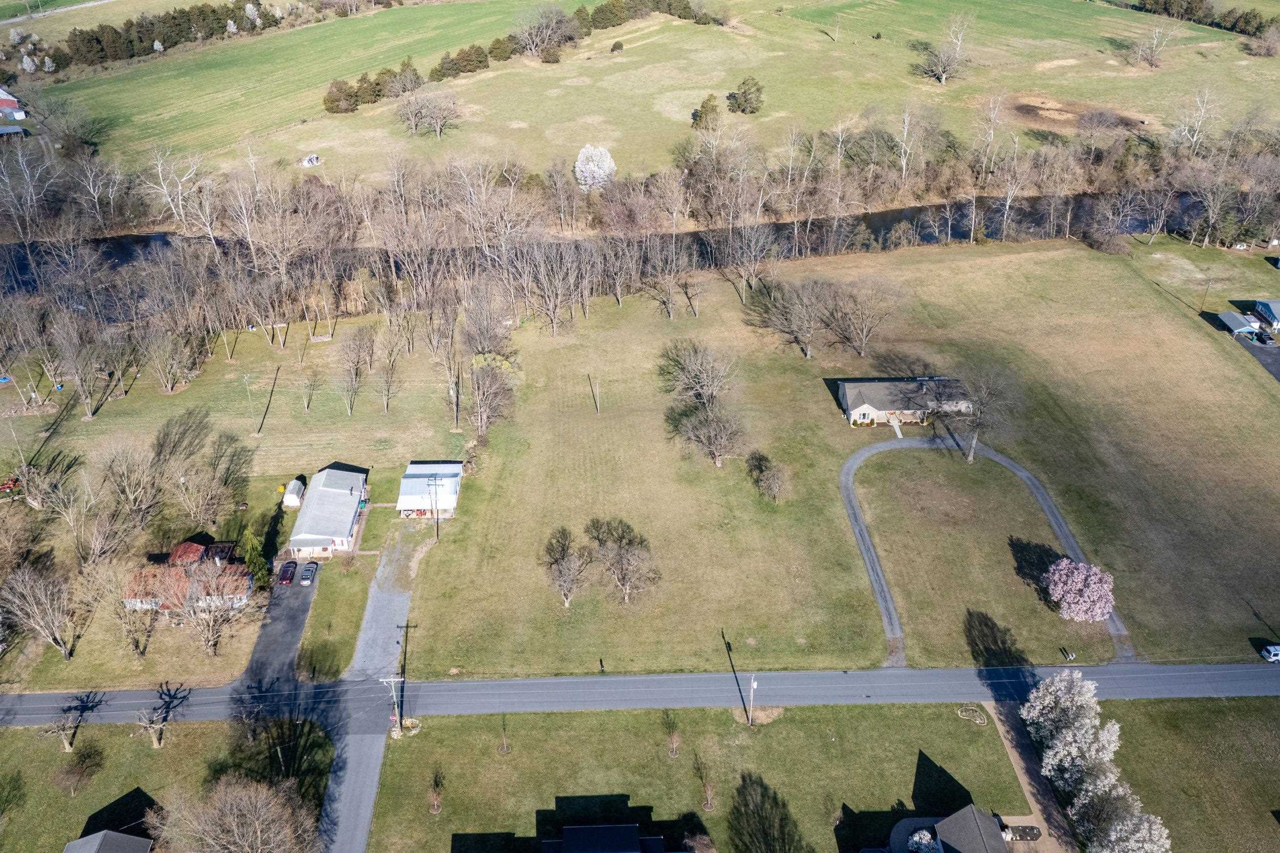 1-2 Riverside Avenue Grottoes, VA 24441 - Photo 11 of 30 an aerial view of residential houses with outdoor space