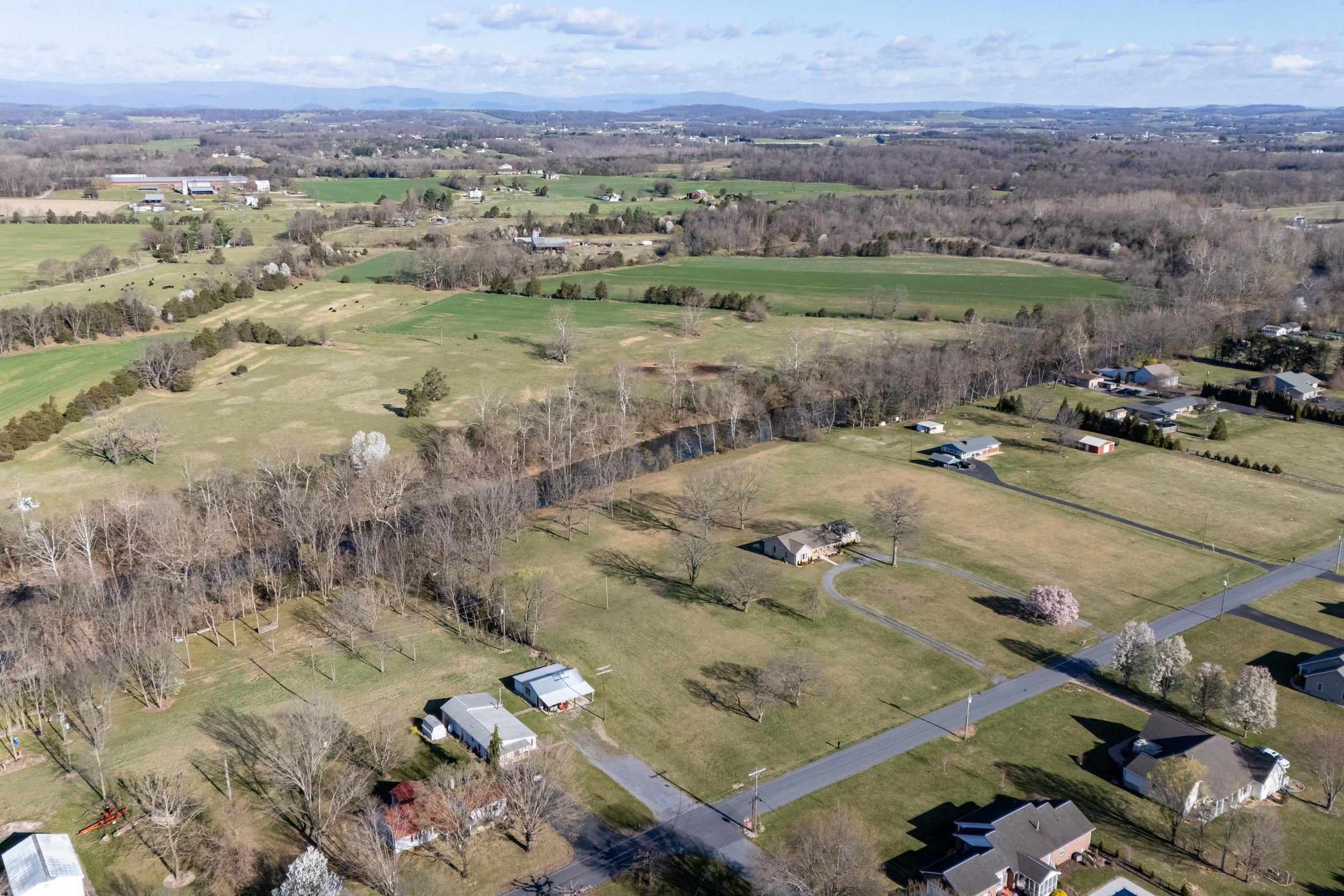 1-2 Riverside Avenue Grottoes, VA 24441 - Photo 14 of 30 an aerial view of a houses with a yard