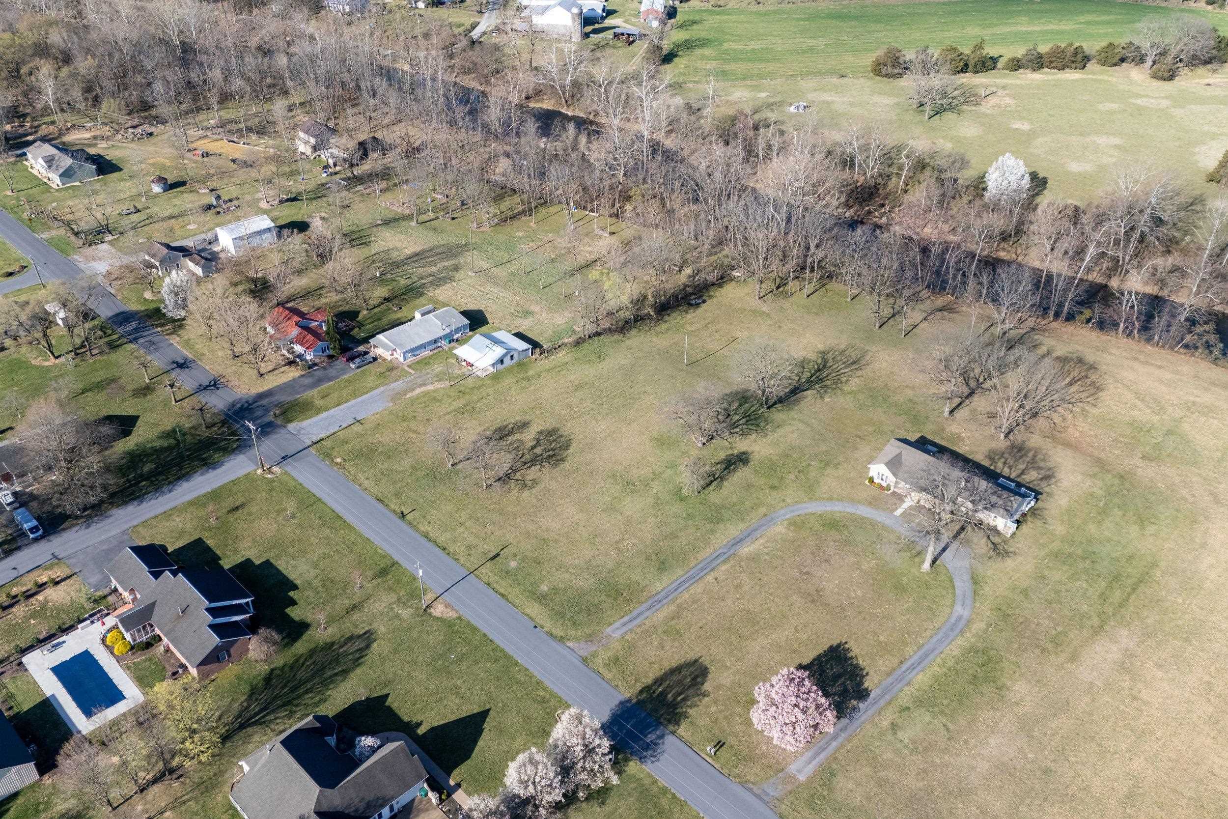 1-2 Riverside Avenue Grottoes, VA 24441 - Photo 10 of 30 an aerial view of a house with a yard