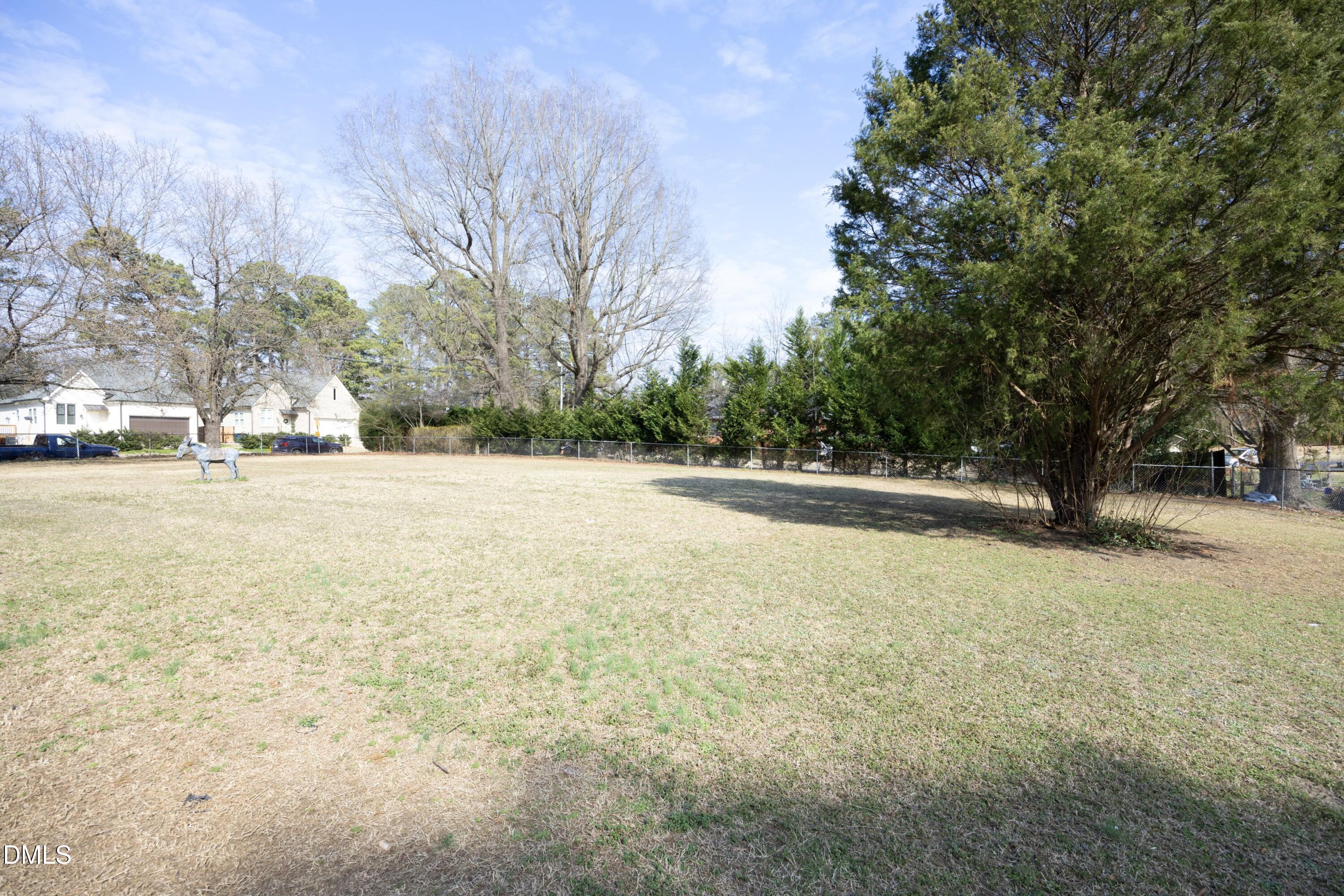3504 Skycrest Drive Raleigh, NC 27604 - Photo 3 of 10 a view of road with trees