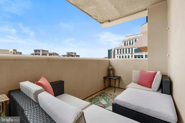 a balcony with furniture