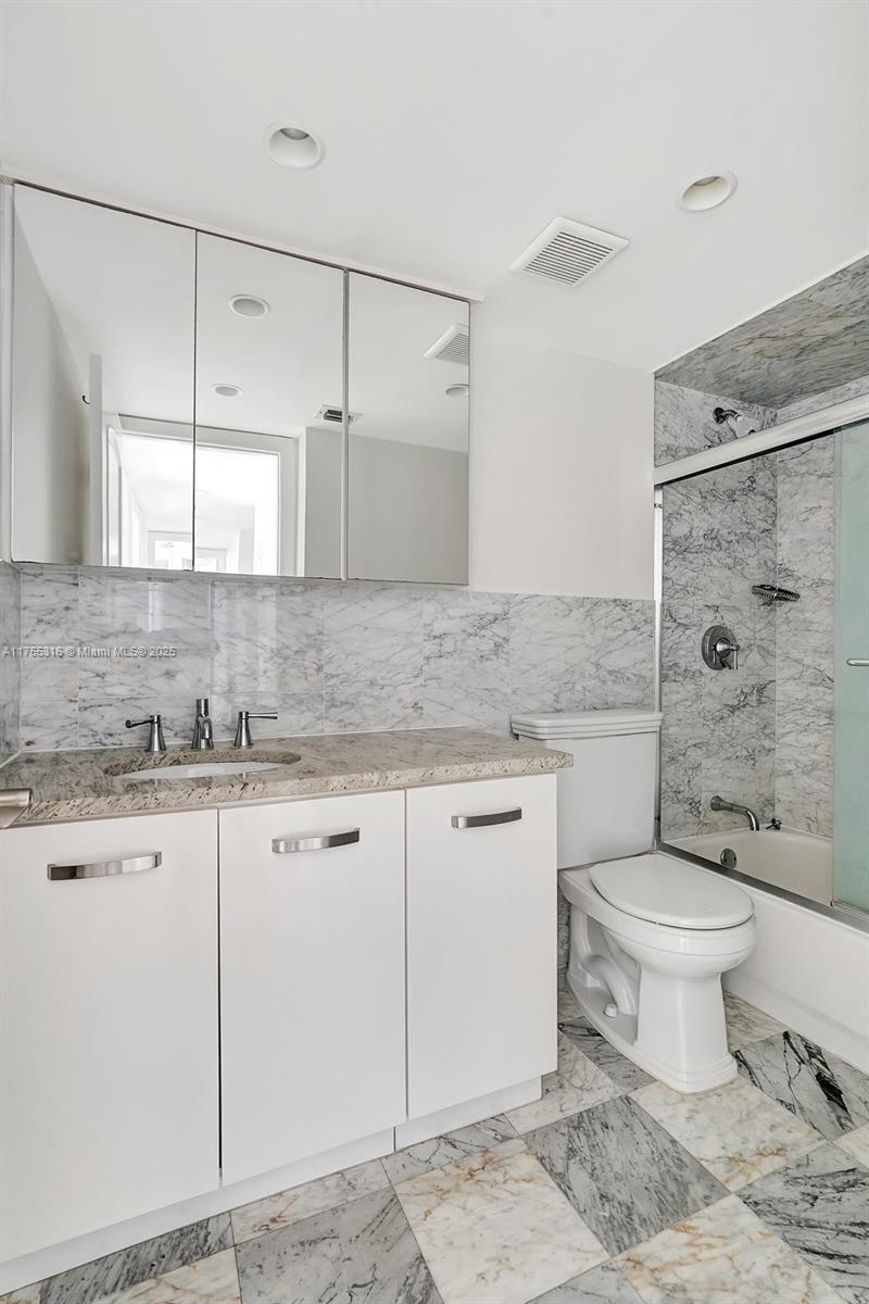 8911 Collins Avenue, Unit 605 Surfside, FL 33154 - Photo 25 of 46 Guest / 2nd Bathroom