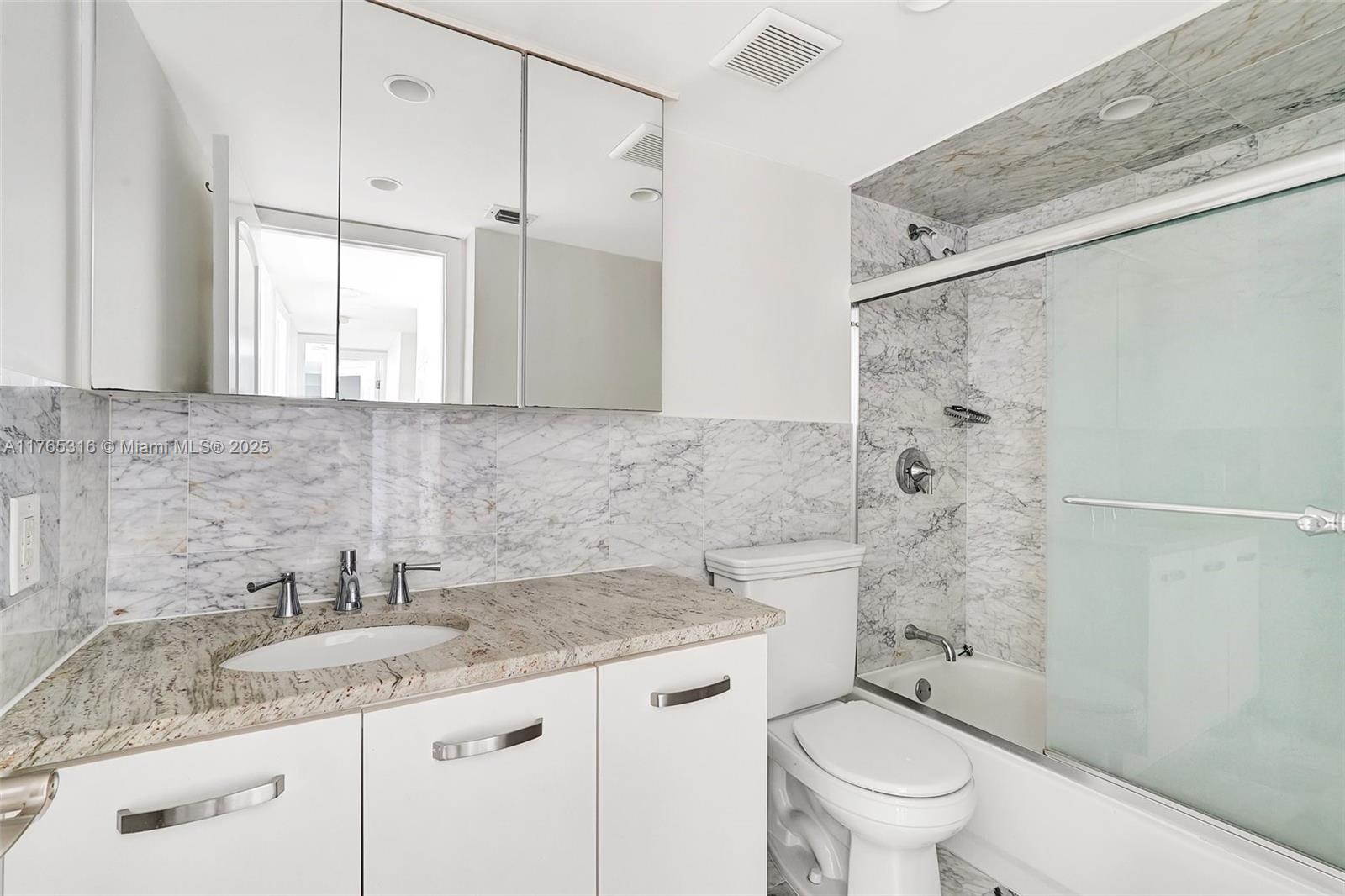 8911 Collins Avenue, Unit 605 Surfside, FL 33154 - Photo 26 of 46 Guest/2nd Bathroom