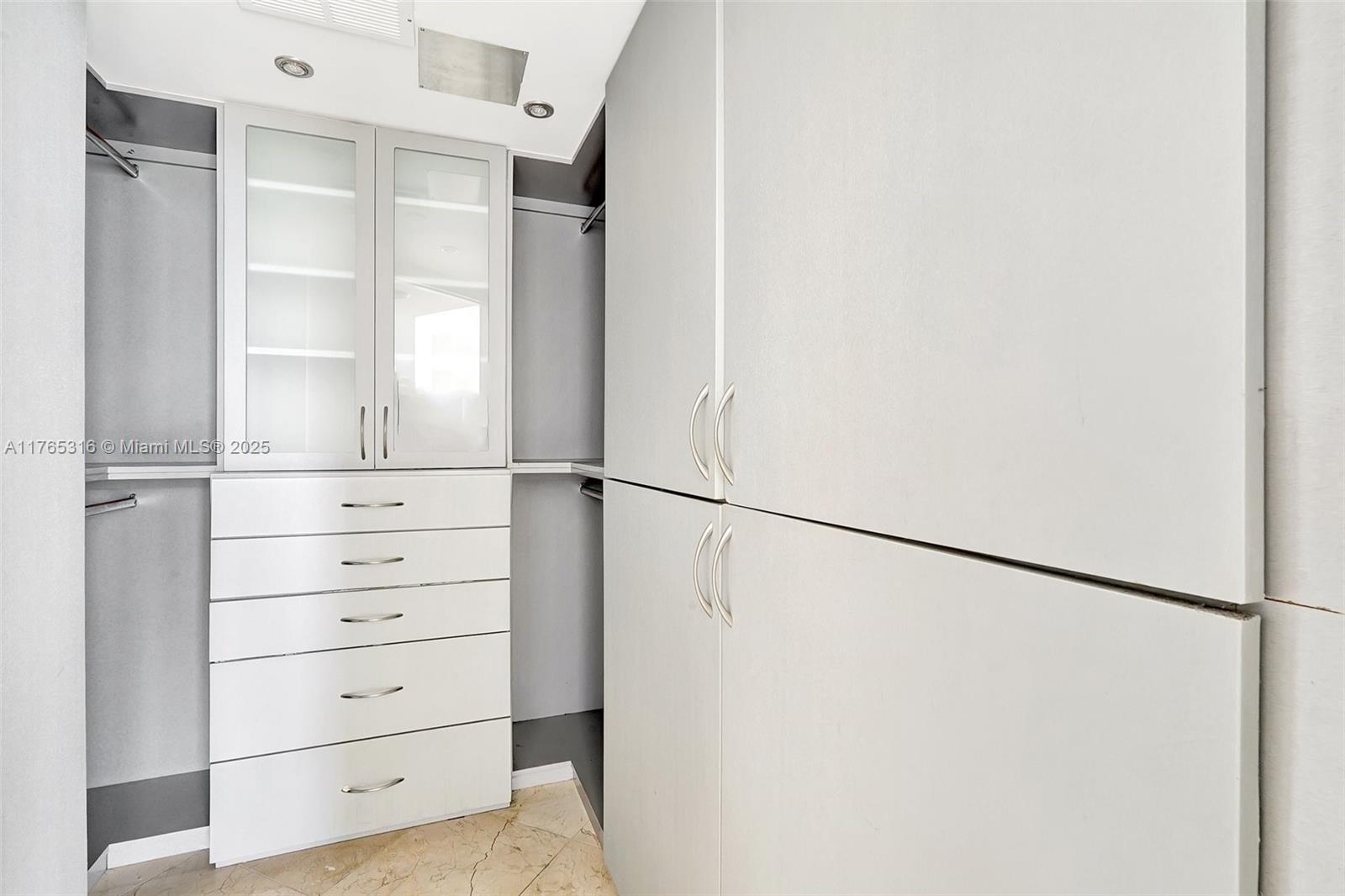 8911 Collins Avenue, Unit 605 Surfside, FL 33154 - Photo 38 of 46 Master Closet