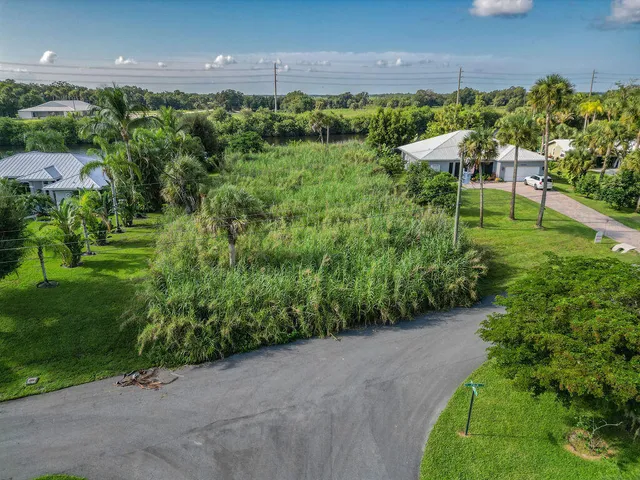 a view of a garden with an outdoor seating
