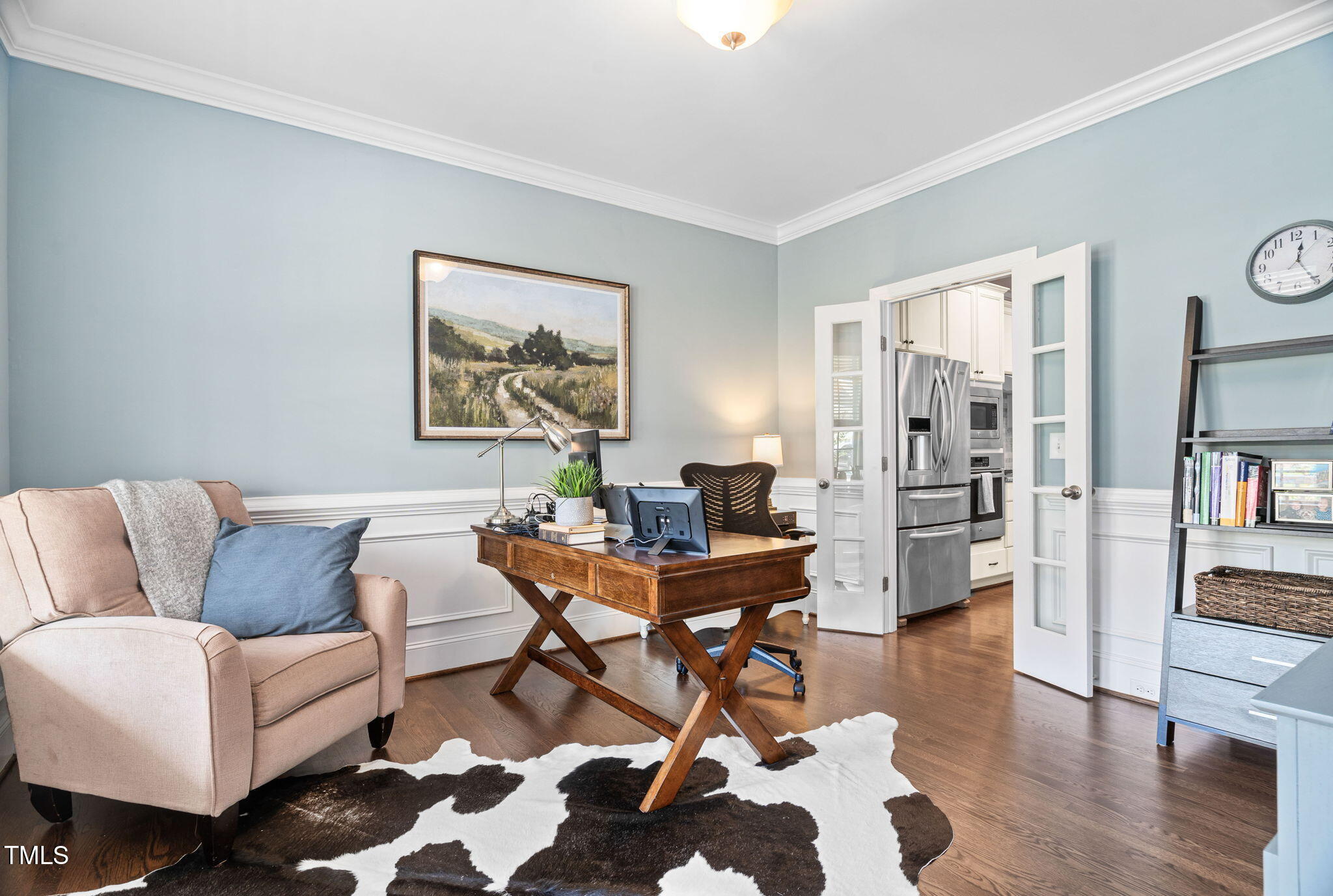 2712 Lake Waccamaw Trail Apex, NC 27502 - Photo 12 of 41 a living room with furniture and wooden floor