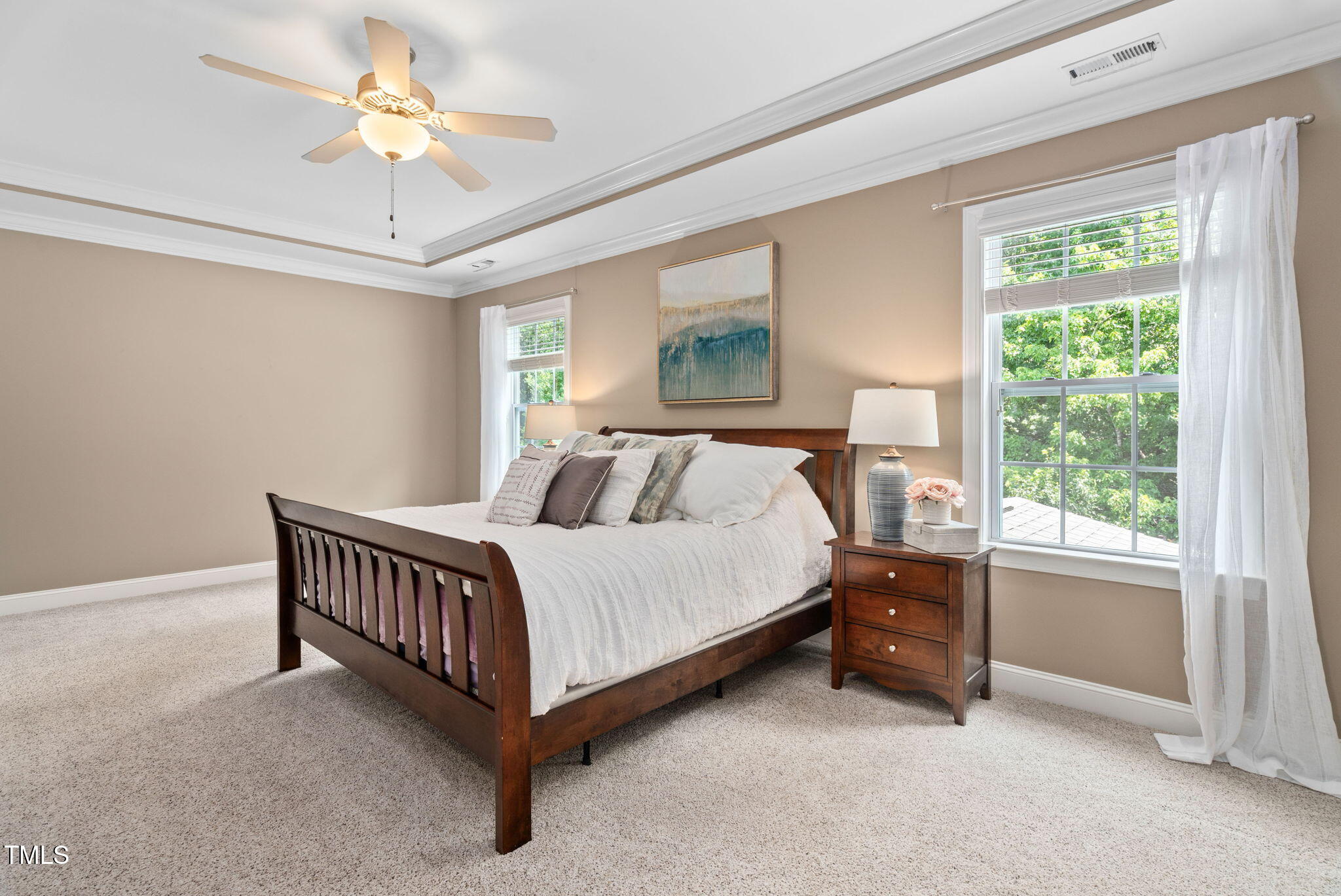 2712 Lake Waccamaw Trail Apex, NC 27502 - Photo 14 of 41 a bed room with a bed and a window