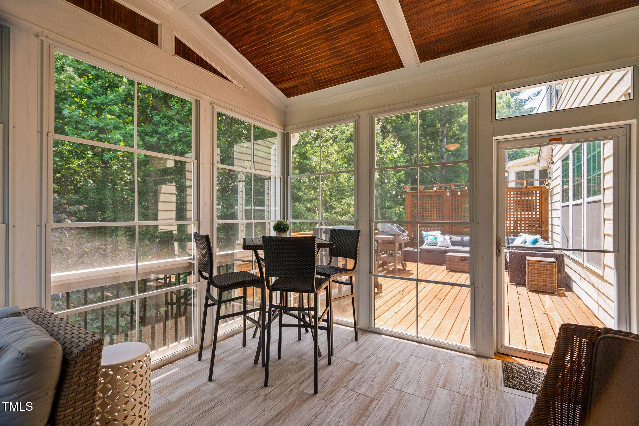 2712 Lake Waccamaw Trail Apex, NC 27502 - Photo 28 of 41 a view of a dining room with furniture window and wooden floor