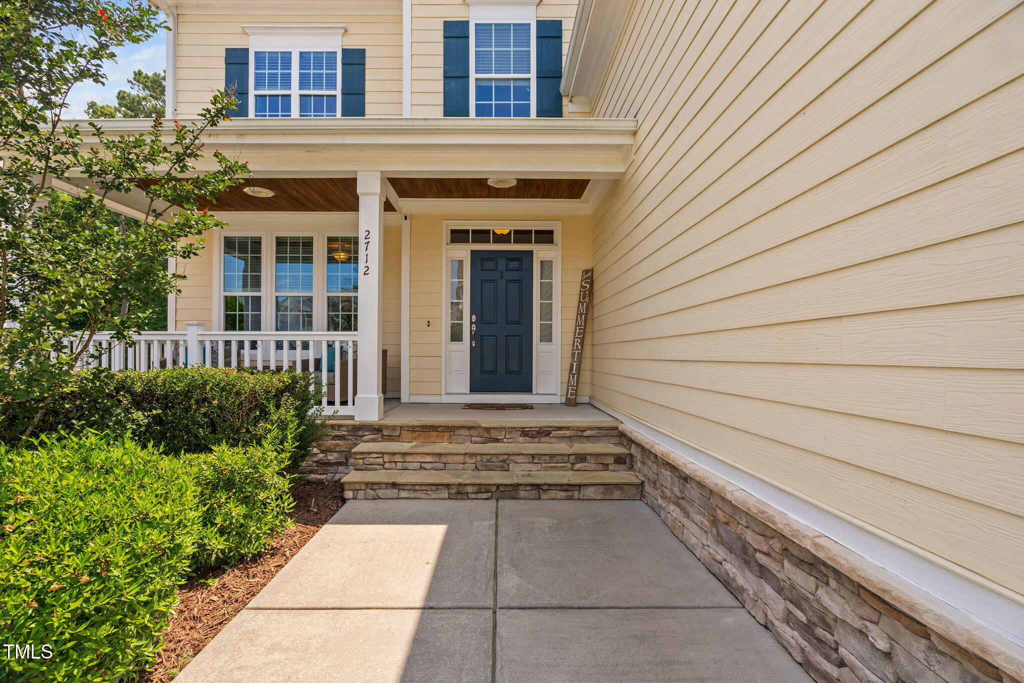 2712 Lake Waccamaw Trail Apex, NC 27502 - Photo 31 of 41 a view of a house with a white door and wooden floor