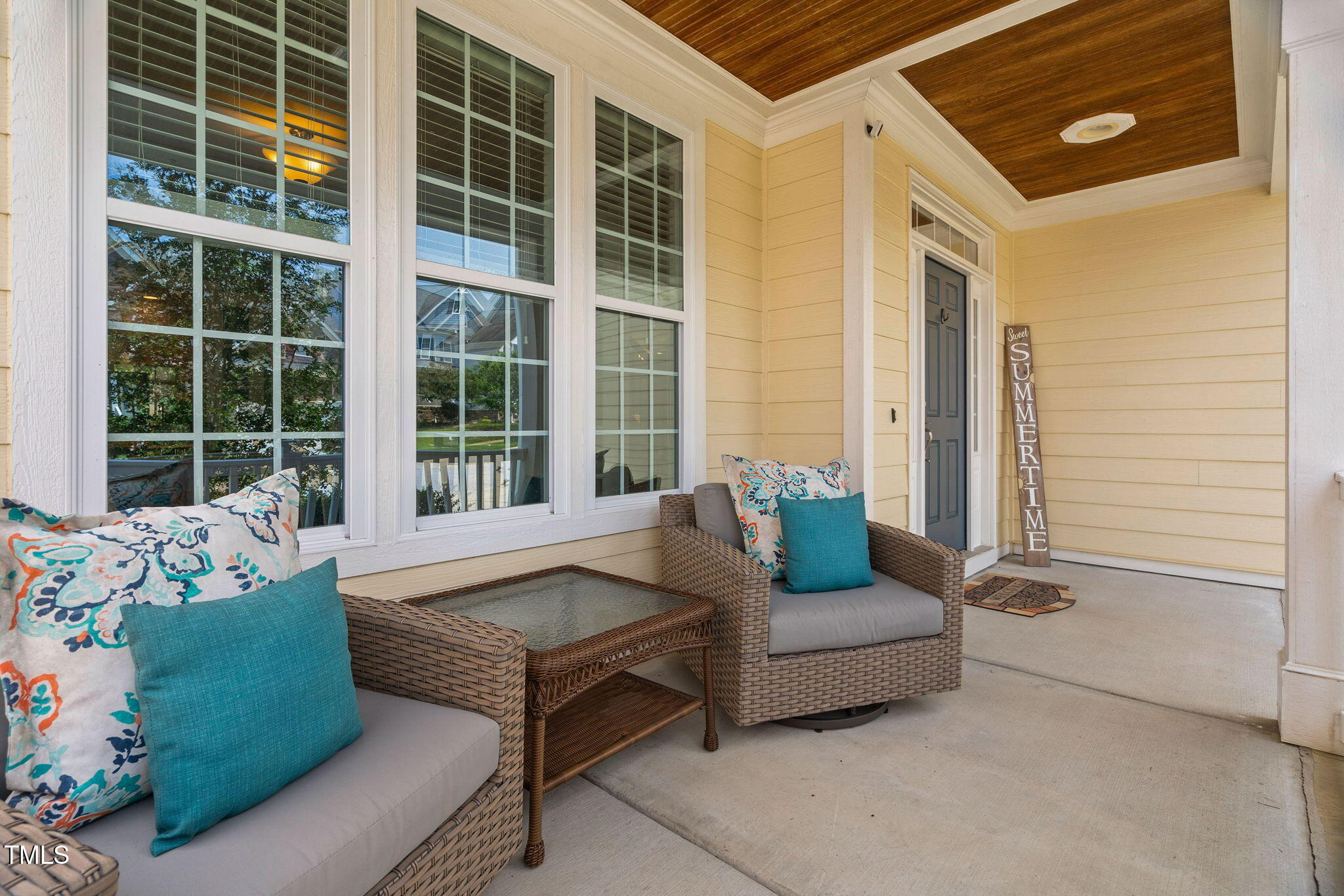 2712 Lake Waccamaw Trail Apex, NC 27502 - Photo 32 of 41 a outdoor living space with furniture and a window