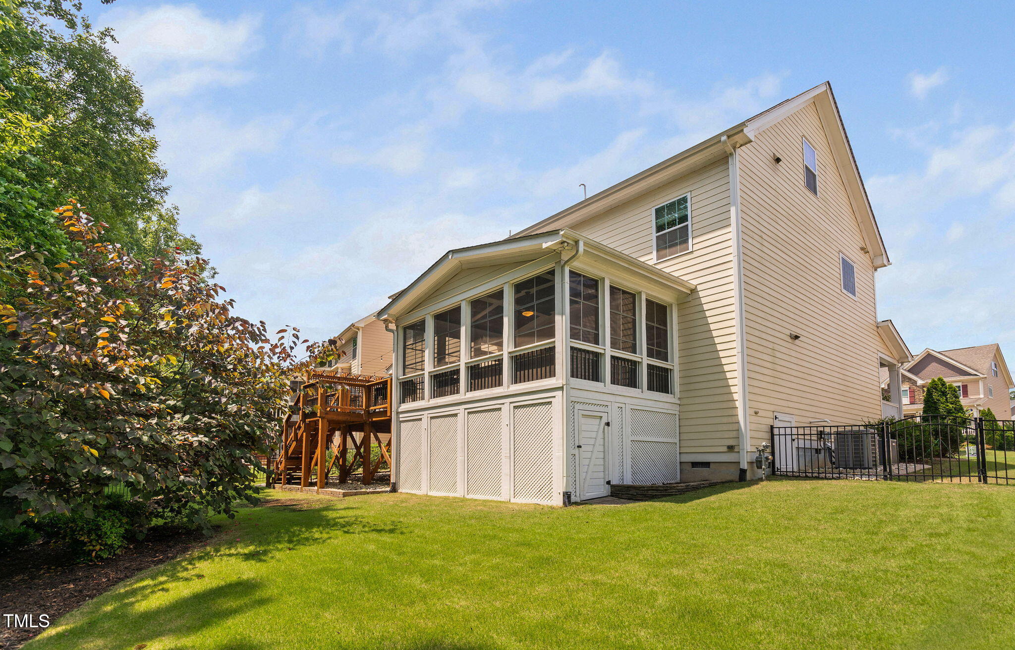 2712 Lake Waccamaw Trail Apex, NC 27502 - Photo 34 of 41 a view of a house with a yard