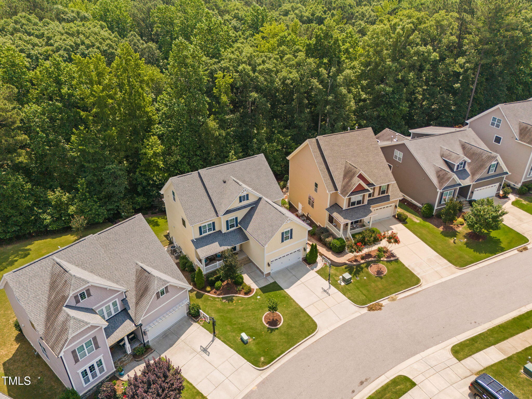 2712 Lake Waccamaw Trail Apex, NC 27502 - Photo 36 of 41 an aerial view of residential house with outdoor space and parking