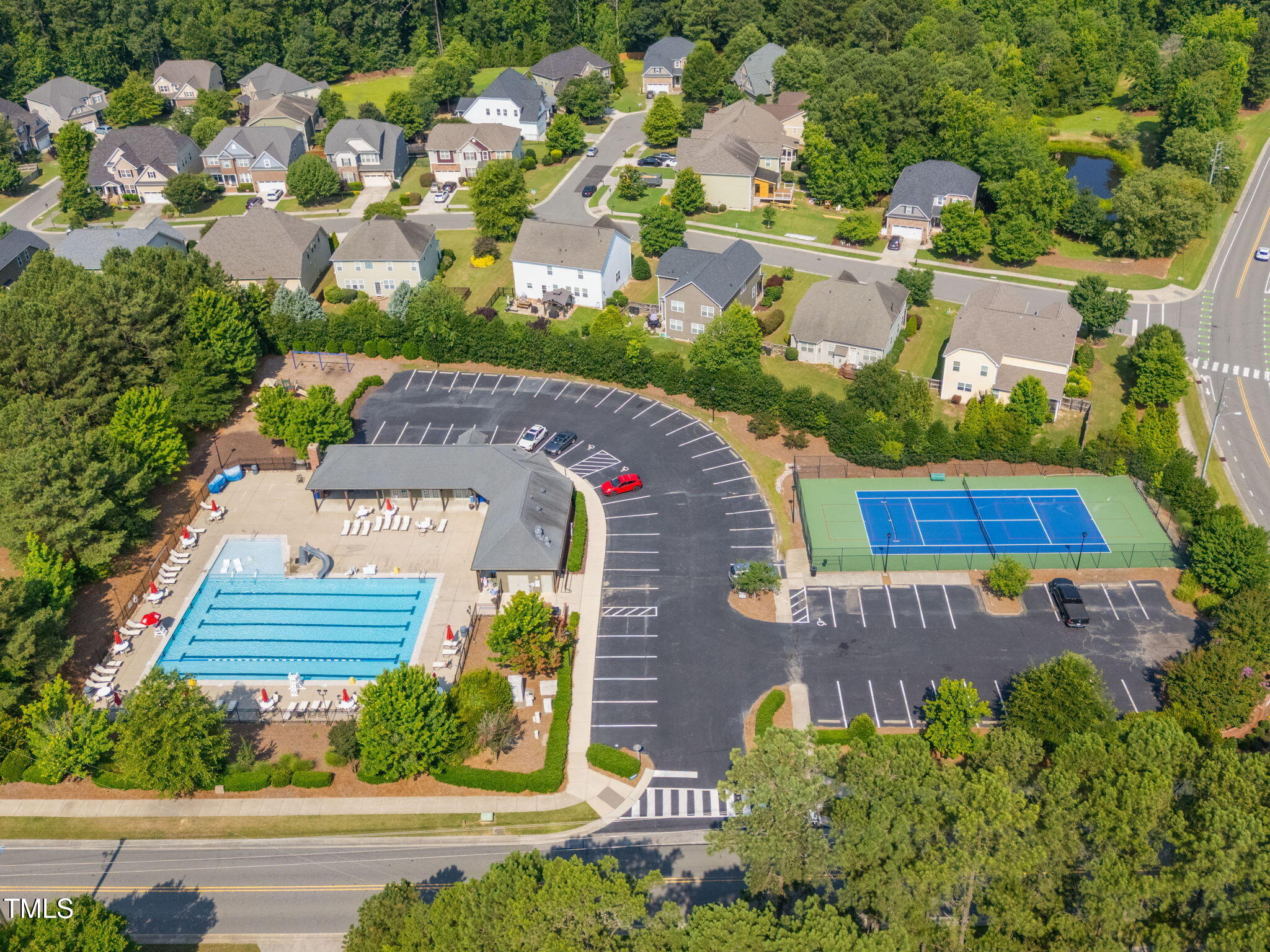2712 Lake Waccamaw Trail Apex, NC 27502 - Photo 38 of 41 an aerial view of a house with a garden