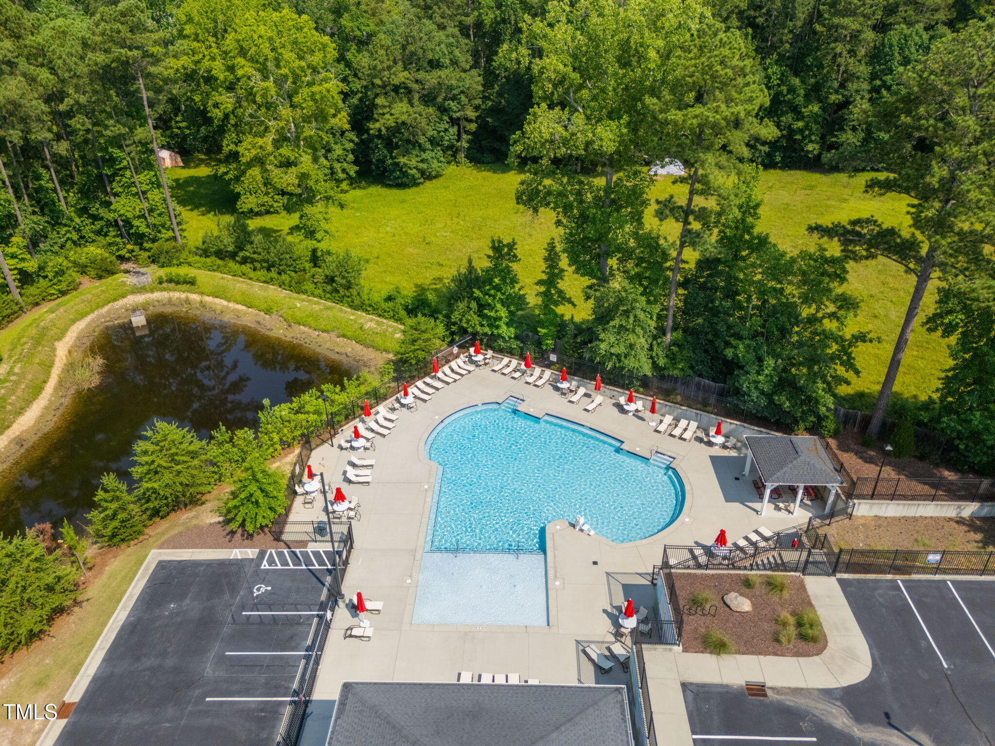 2712 Lake Waccamaw Trail Apex, NC 27502 - Photo 40 of 41 an aerial view of a house with a yard and lake view