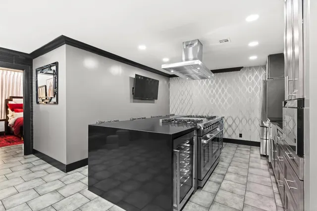 a lobby with furniture and stairs