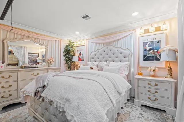 a bathroom with a toilet a sink and glass door