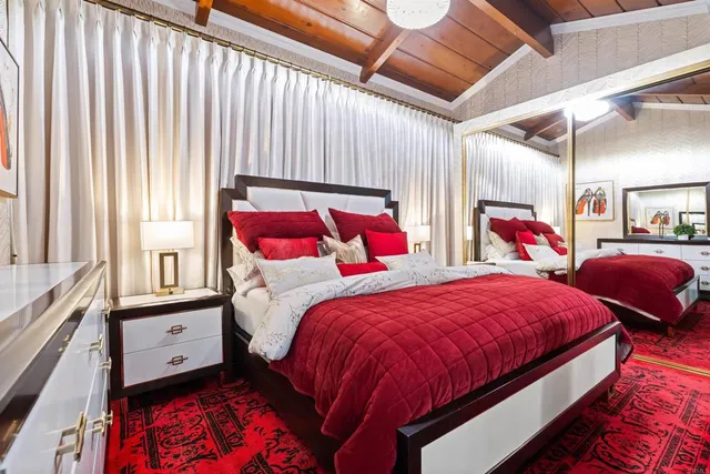 a bedroom with a bed and a closet