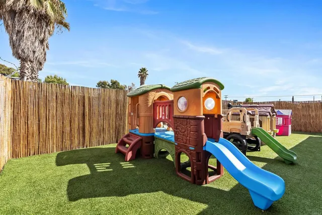 a outdoor space with lots of furniture and garden view