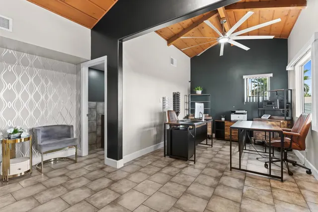 a kitchen with stainless steel appliances a sink and a stove