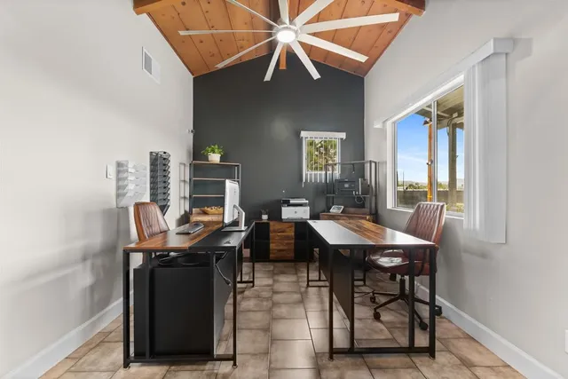 a view of street with a house