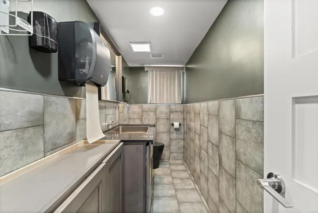 a view of a house with a street