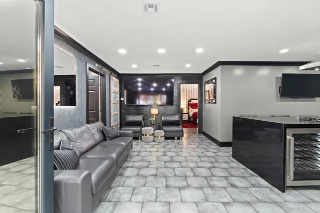 a kitchen with stainless steel appliances granite countertop a sink a oven and a counter top space