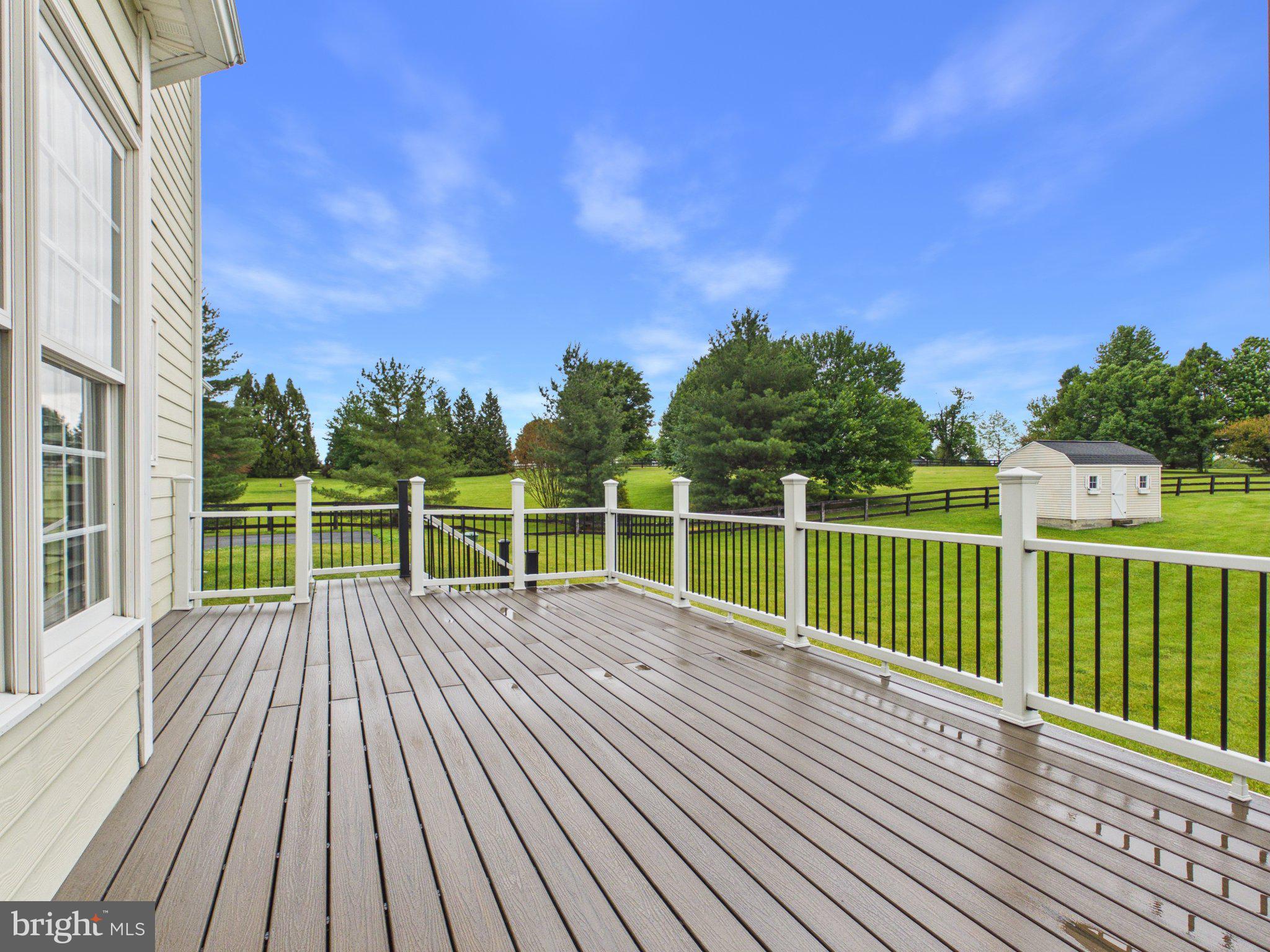 38565 Piggott Bottom Road Hamilton, VA 20158 - Photo 24 of 85 a view of deck with a large window and wooden floor