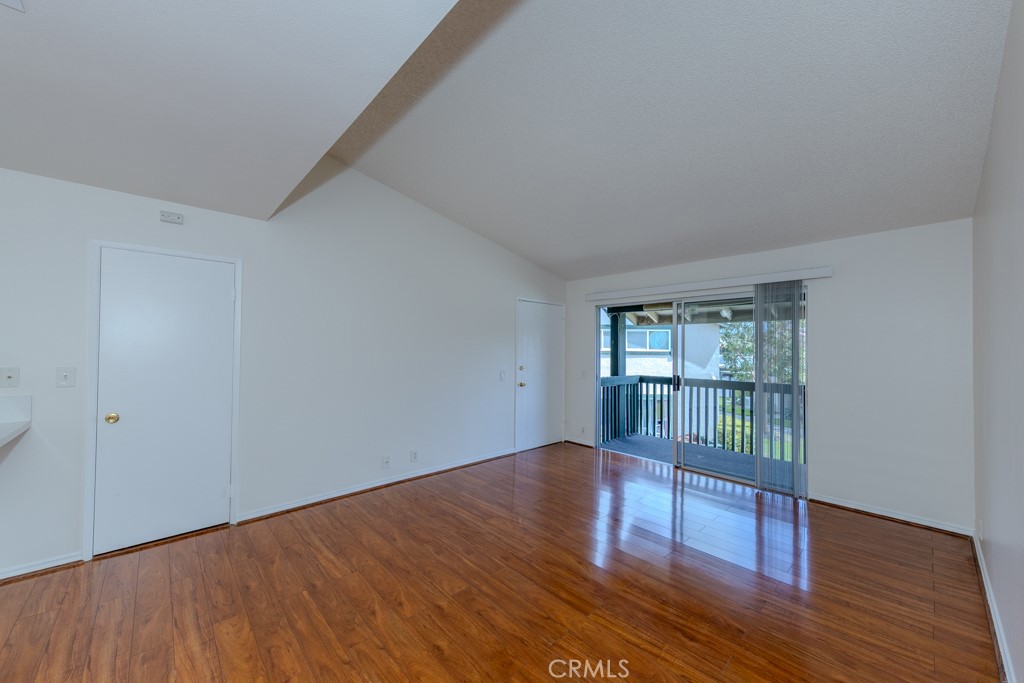 23222 Orange, Unit 4 Lake Forest, CA 92630 - Photo 16 of 35 wooden floor in an empty room with a window