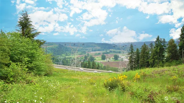 a view of a lake with a building in the background