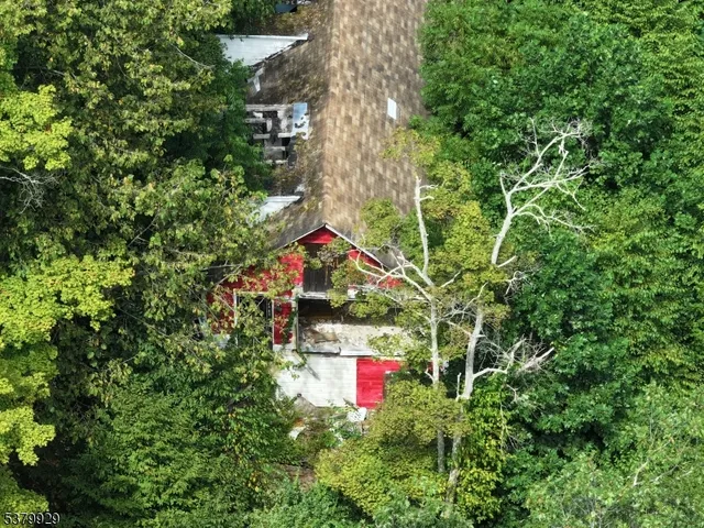a backyard of a house with outdoor seating and green space