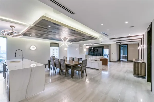 a lobby with furniture and window