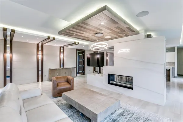 a living room with furniture and a table