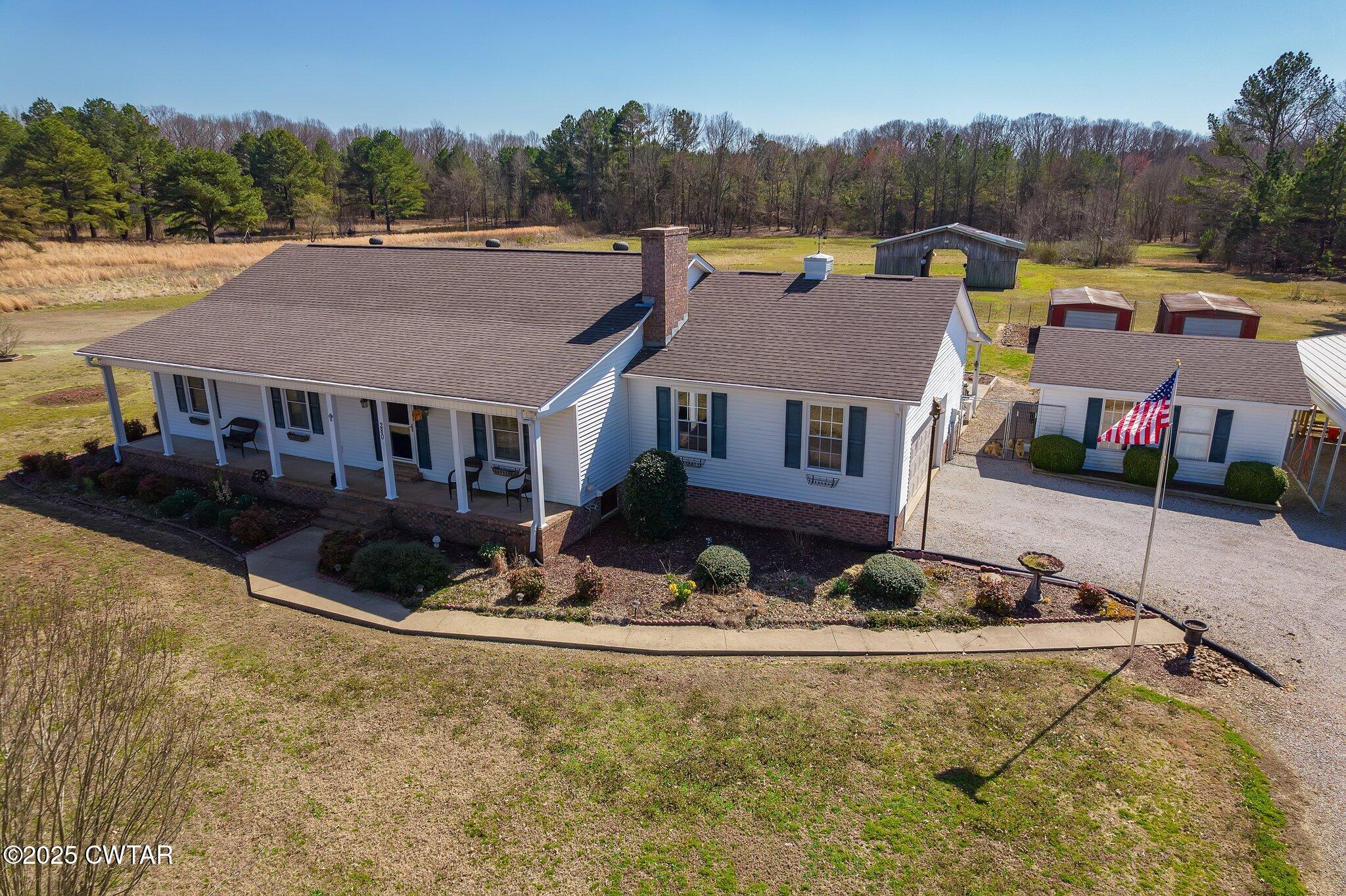 a house with river in front of it